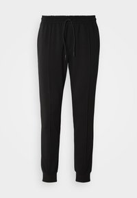 CARROT FIT IN INTERLOCK BLEND WITH LOGOED BADGE - Träningsbyxor - black