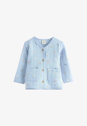 Light blue quilted cardigan with a rounded neckline, wooden buttons, two front pockets, and floral embroidery in multiple colors.