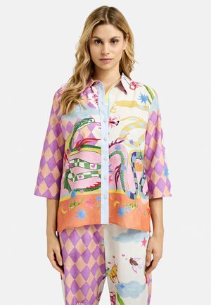 Multicolored, patterned shirt with a button placket, short sleeves, and a light blue collar featuring playful designs of snakes and flowers.