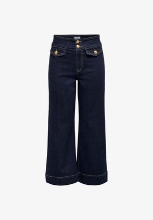 Jean large bleu marine taille haute avec fermeture à double bouton et poches à rabat à boutons dorés à l'avant.