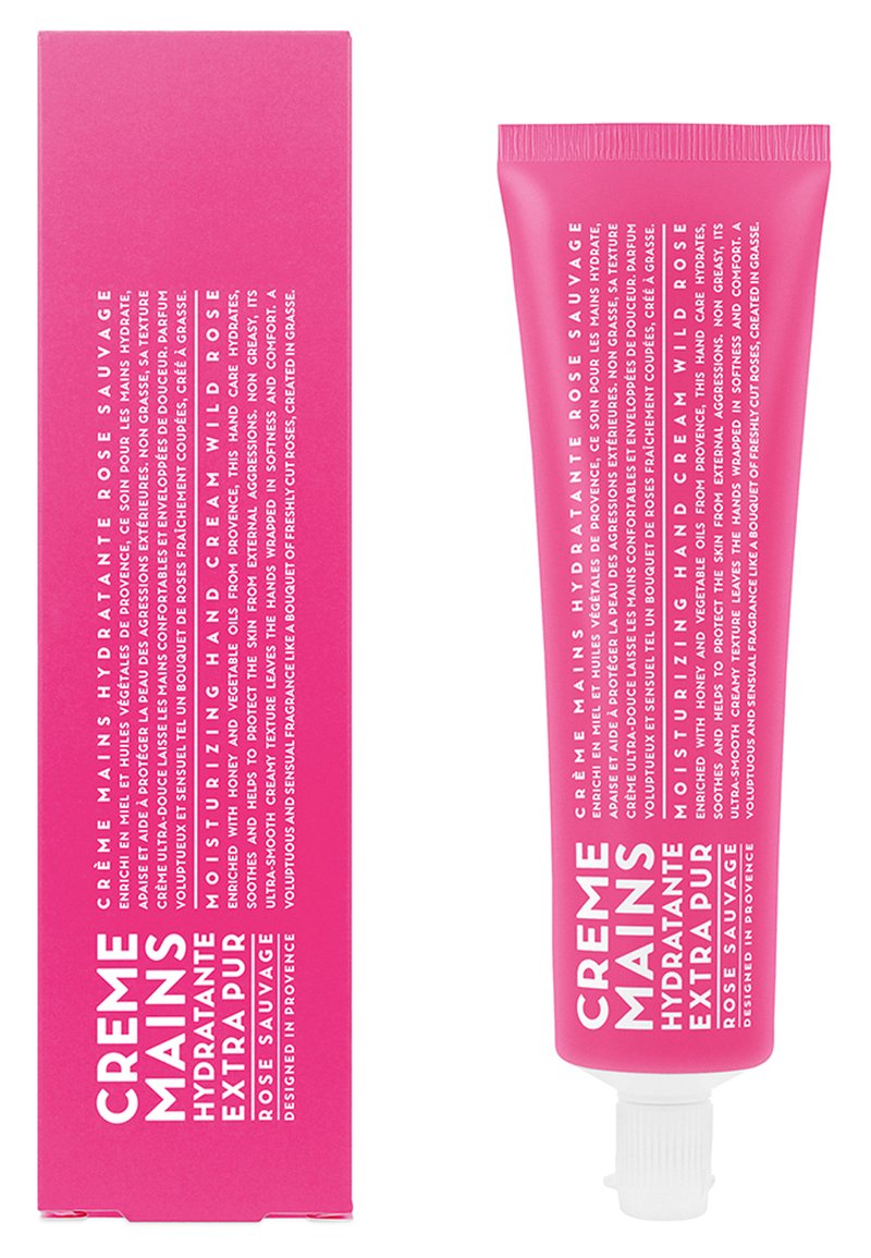 Rosa Tube mit Feuchtigkeits-Handcreme in weißer Schrift, begleitet von einer passenden rosa Box, beide beschriftet mit "Crème Mains Hydratante Rose Sauvage."