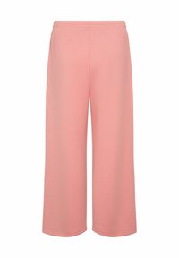Lichtroze, wijde broek van zachte stof, met een elastische tailleband en zonder zichtbare zakken of versieringen.