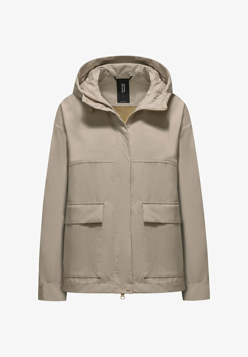Veste beige à capuche avec fermeture éclair frontale, boutons-pression et deux grandes poches à rabat sur un fond uni.