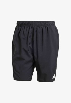 Black athletic shorts featuring an elastic waistband, lightweight fabric, and a reflective accent logo on the lower left side.