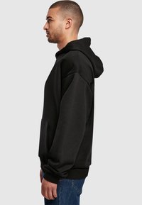 Merchcode NITM-CLEAN X ULTRA HEAVY  - Mikina s kapucí - black