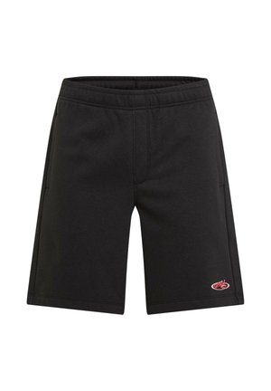Čierne bavlnené šortky s elastickým pásom, dvoma bočnými vreckami a malým červeným logom v dolnej pravej časti. Hladká textúra a rovný strih.