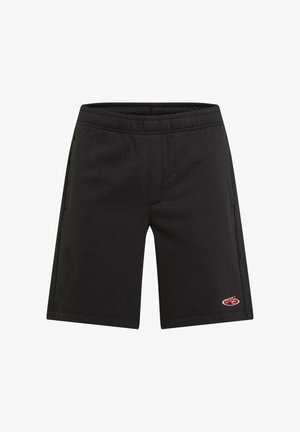Shorts en coton noir avec taille élastique, deux poches latérales et un petit logo rouge sur le bas du côté droit. Texture lisse et coupe droite.