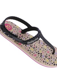 Chancla negra trenzada con una plantilla de color beige estampada con manchas coloridas. Suela rosa con un pequeño acento de logo plateado.
