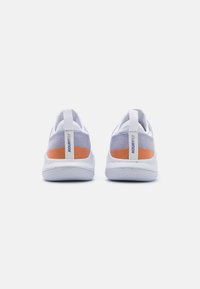 White athletic shoes with a breathable mesh upper, orange accents, and a textured white sole. Features a heel pull tab for easy wear.