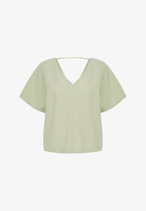 Lys grøn linned top med V-hals og korte, brede ærmer. Har en crossover rygstrop-design og en afslappet pasform.