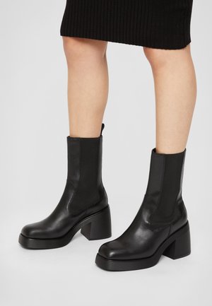 Højhælede støvler - black