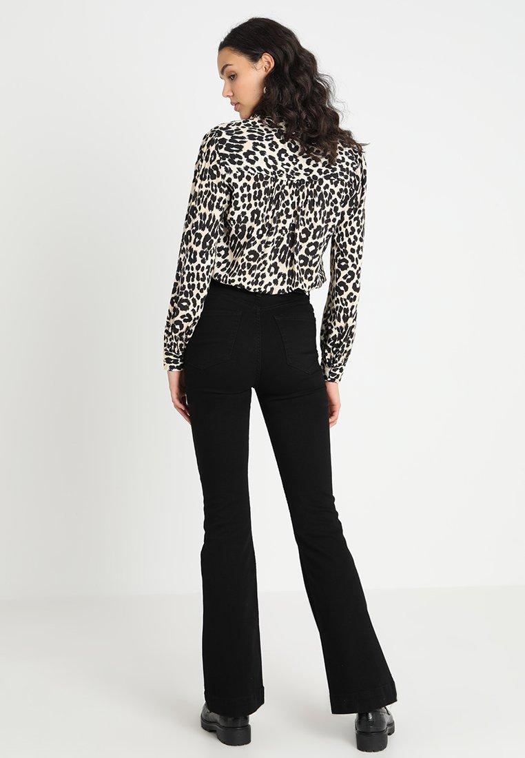 urban outfitters black flare jeans