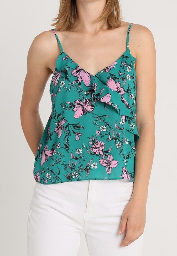 Kamizelka w kwiatowy wzór w odcieniu teal z różowymi i białymi kwiatami. Posiada cienkie regulowane ramiączka oraz falbany wzdłuż dekoltu.