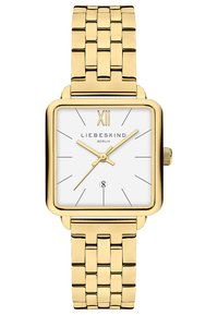 Quadratische goldene Uhr mit einem weißen Zifferblatt, goldenen Stundenmarkierungen und Zeigern. Verfügt über ein geflochtenes goldfarbenes Metallarmband und eine Datumsanzeige auf 6 Uhr.