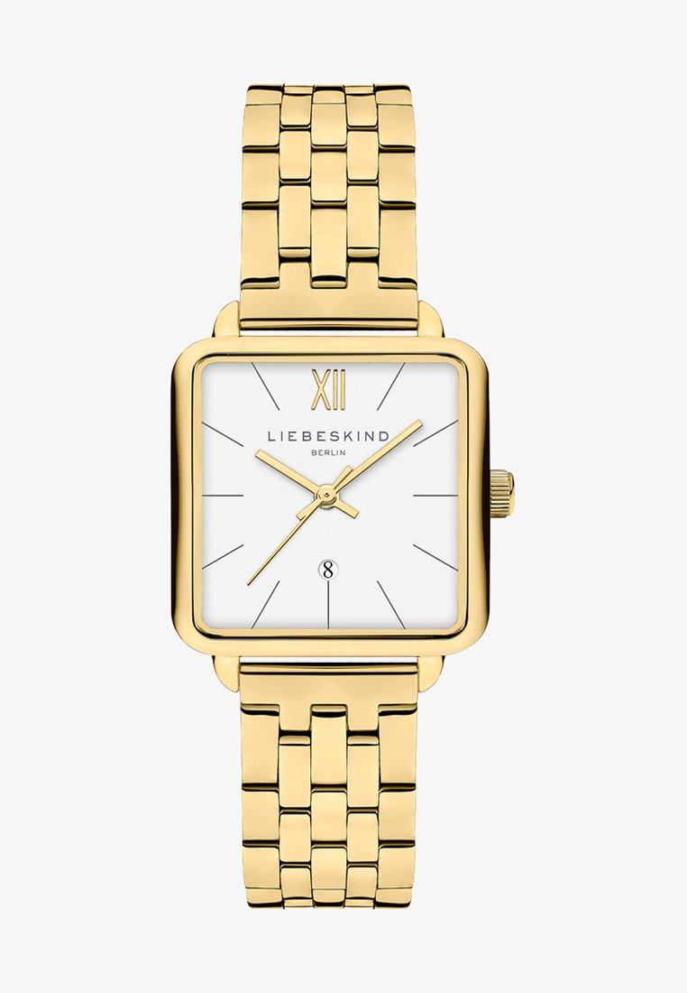 Montre carrée en or avec un cadran blanc, des index en or et des aiguilles. Comprend un bracelet en métal tressé doré et un affichage de la date à 6 heures.