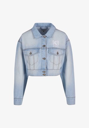 Heledane sinine teksajakk, millel on kaks esipocketit, metallnupud ja tikandiga "KANI" logo. Valmistatud pehmest teksakangast.