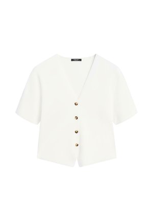 Weiße Bluse mit kurzen Ärmeln und V-Ausschnitt, vorne mit vier braunen Schildpattknöpfen und einer kurzen, kastigen Passform.