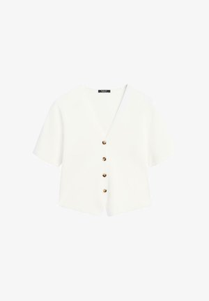 Witte V-hals blouse met korte mouwen, vier bruine schelpknopen aan de voorkant en een cropped, boxy pasvorm.