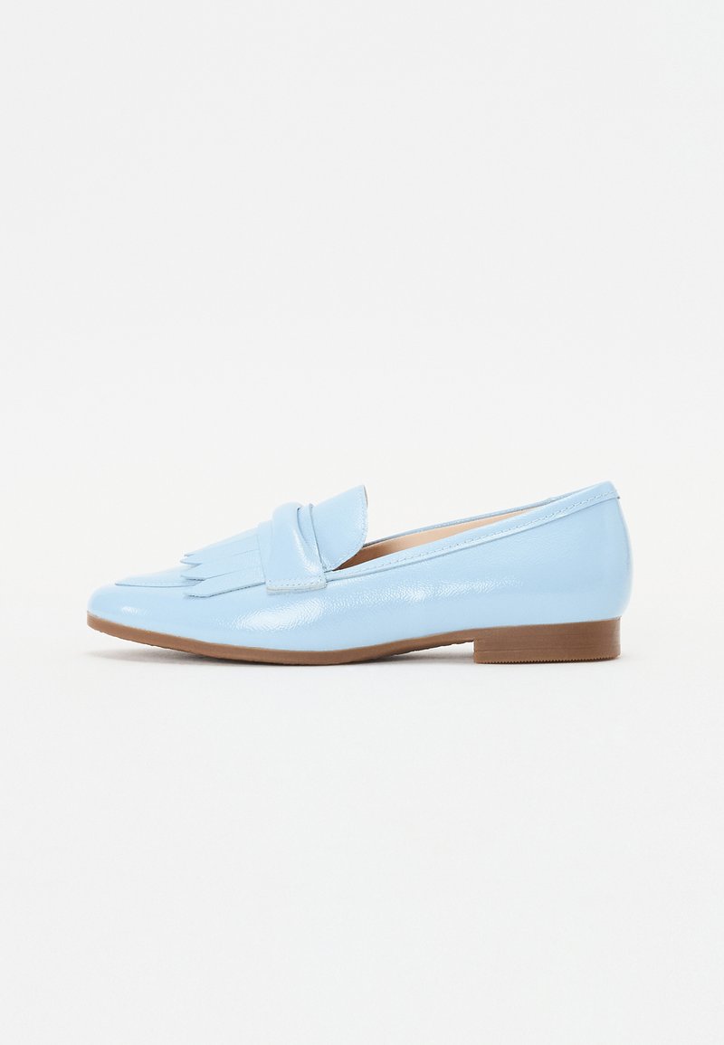 Light blue patent leather loafers with a decorative fringe detail, almond-shaped toe, and low brown heel. Smooth texture throughout.