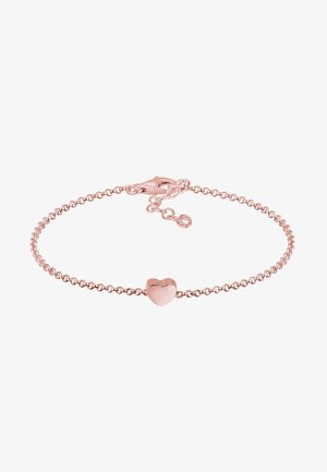Náhrdelník z ružového zlata s jemným reťazcom, so lesklým srdiečkovým príveskom v strede. Zabezpečený sponou vo forme homáre a s nastaviteľným reťazcom.