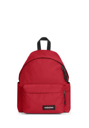 Red nylon backpack with a curved top, front zip pocket, adjustable black straps, and Eastpak logo. Smooth texture with a minimalist design.