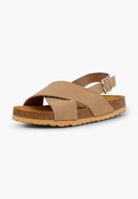 Tan leather sandal with an adjustable buckle, cross-strap design, cork footbed, and rubber sole featuring a textured grip pattern.