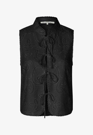 Melna bezpiedurkņu veste ar ziedu izšuvumiem un saites aizdari, ar mandarin stila apkakli un viļņainiem malām. Mīksta tekstūra un elegants dizains.