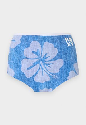 Braguitas de bikini azules con grandes estampados de flores blancas de hibisco y el logo "ROXY" en blanco en la esquina superior derecha.