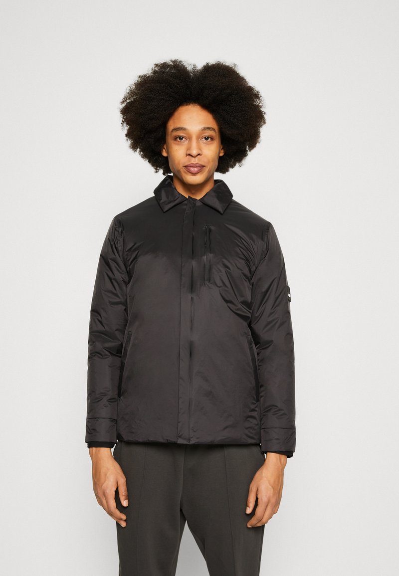 Rains FUSE OVERSHIRT UNISEX Übergangsjacke black/schwarz Zalando.de