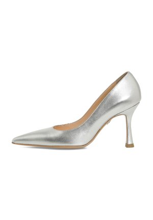 Metallic silver high heel shoe with a pointed toe, side cutout, and slim heel. Smooth texture with a shiny finish and a beige interior.