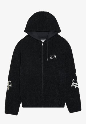 Sort lynlås hoodie lavet af tekstureret fleece. Har en hætte med snoretræk og broderede detaljer, herunder "LA" på brystet og et design på ærmerne.