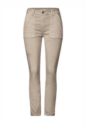 Pantalons beiges à jambe droite en mélange de coton, dotés de deux poches avant, d'un détail usé sur la jambe gauche et d'une fermeture à bouton.