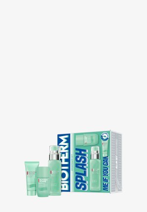 Biotherm Homme Aquapower Pflegeset bestehend aus Reiniger, Feuchtigkeitscreme und fortschrittlichem Gel in hellgrüner Verpackung mit blauer und weißer Schachtel.