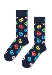 Marineblauwe sokken met kleurrijke pretzelpatronen in groen, geel, blauw, rood en roze, met een accent van de tekst "HAPPY" nabij de teen.