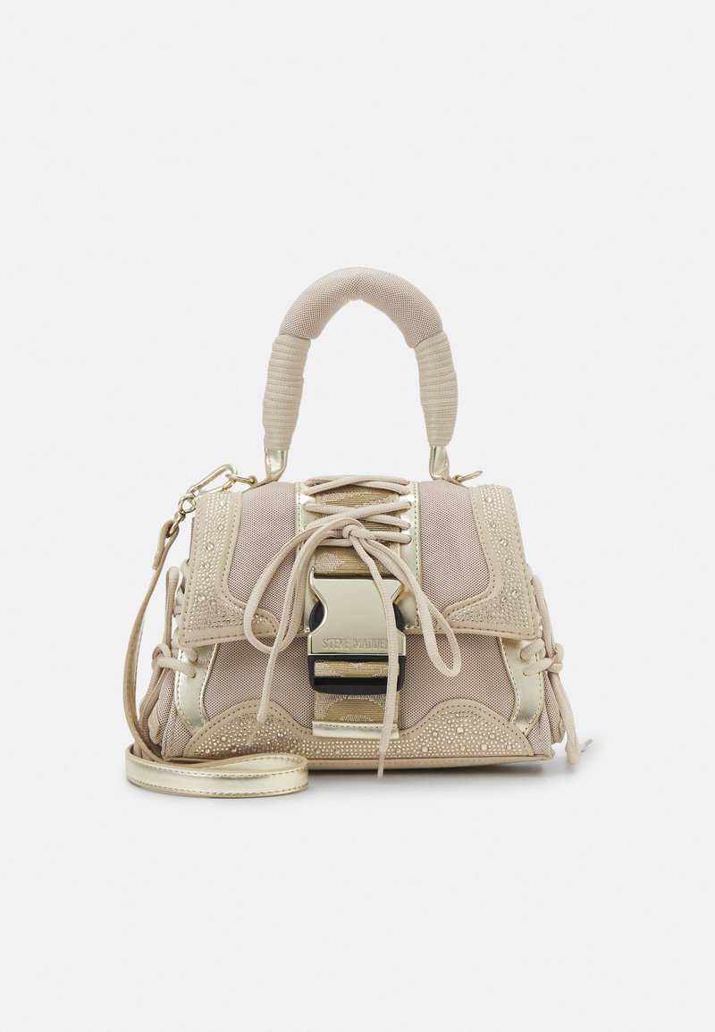 Beige handbag with a textured fabric and metallic accents. Features a top handle and adjustable shoulder strap; lace-up design with studs.
