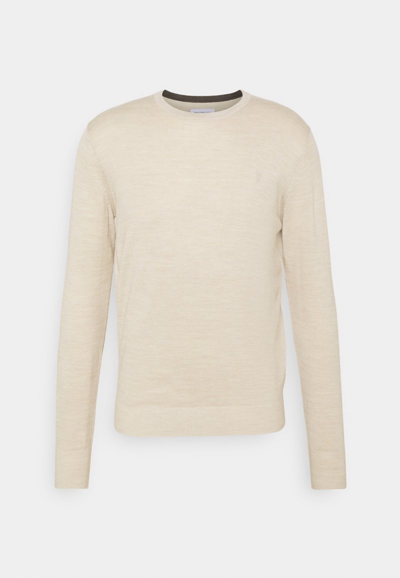 Pull beige à manches longues avec col rond, poignets et ourlet côtelés, affiché sur un fond clair uni.