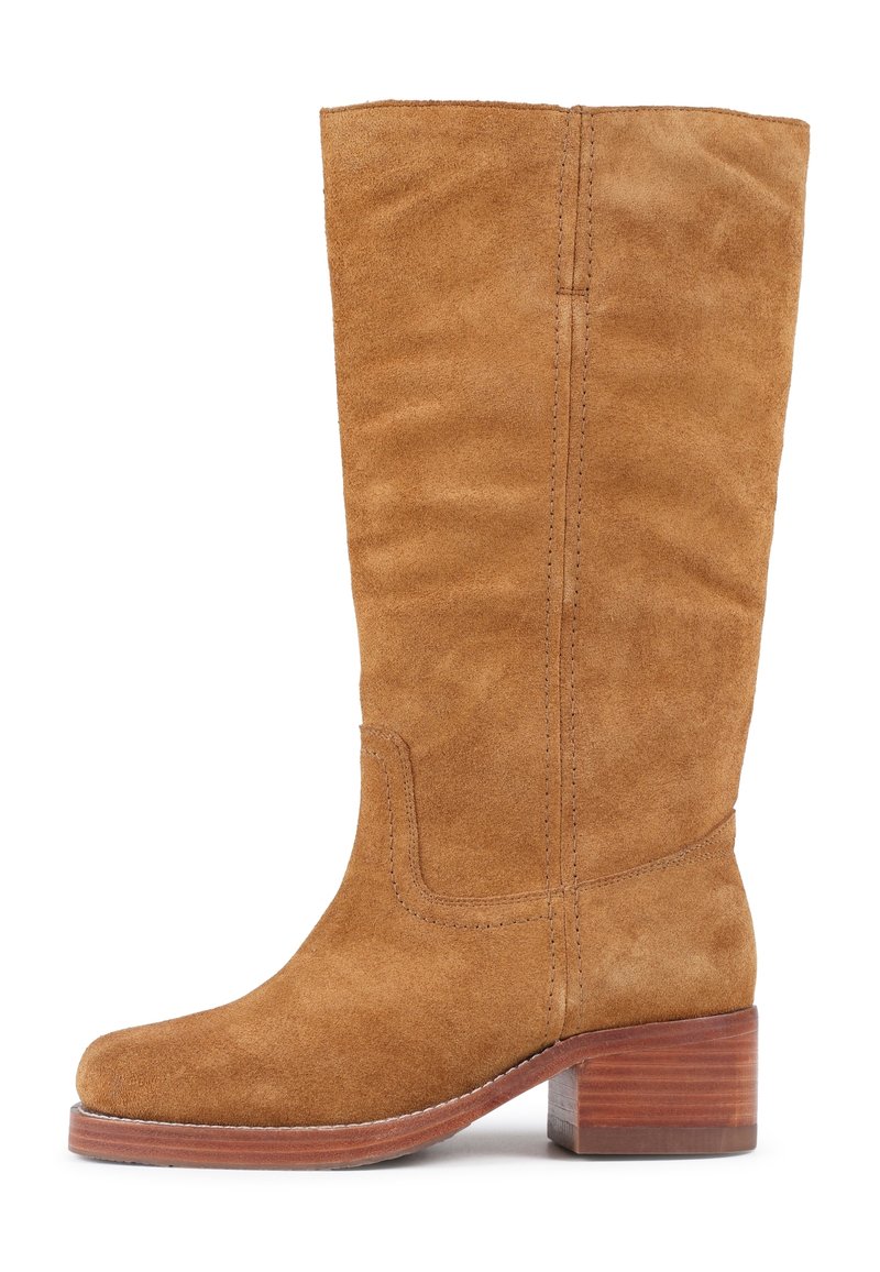 Suede knee-high boot in tan with a slightly rounded toe, stacked heel, and visible stitching details along the sides.
