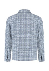 Lange mouwen shirt in lichtblauw met een wit geweven patroon, met een puntkraag en knoopmanchetten, gemaakt van textuurstof.