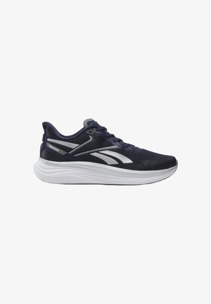 Granatowy but do biegania z białą podeszwą, logo Reebok po bokach, siateczkowa cholewka i sznurowane zapięcie, zaprojektowany do użytku sportowego.