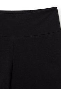 B.ANGEL FLARE-FIT STRETCH - Legging (type pantalon) - black