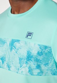 Fila CAILAN - Sports T-shirt - ice green