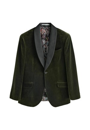 Mörkgrön sammetsblazer med satinsvarta slag, enda knappstängning och två framfickor. Inredningen har ett mönstrat foder.