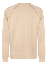 Beige sweatshirt, blødt stof, rund hals, lange raglanærmer, minimal syningdetalje, ribbede manchetter og kant, ensfarvet, enkel design.