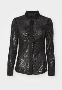 Zwart shirt met pailletten, lange mouwen, kraag, knoopsluiting aan de voorkant en effen zwarte manchetten. Sprankelende textuur met een getailleerde pasvorm.