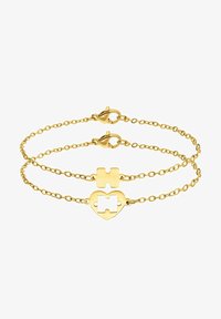 Geselecteerd, gold-coloured
