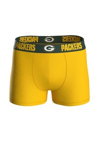 Žluté boxerské trenýrky se zeleným pasem nesoucím nápis "PACKERS" a logem. Hladká látka a těsné padnutí.