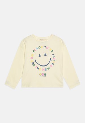 HAPPY PLACE UNISEX - Tops ar garām piedurknēm - vanilla cream