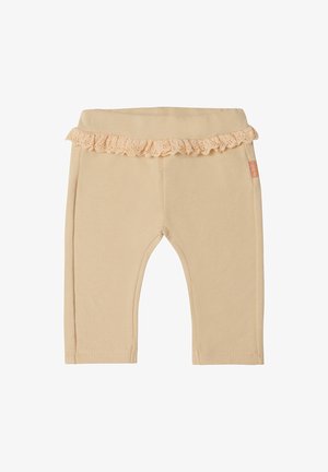 Beige Baby-Leggings mit elastischem Bund und dekorativer Spitzenrüsche rund um die Taille.