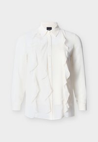 Λευκό μακρυμάνικο μπλουζάκι με κουμπιά στην μπροστινή πλευρά και καταρράκτη βολάν και στις δύο πλευρές του μπροστινού μέρους.