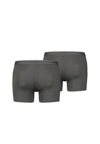 Boxers gris avec une texture lisse, design à jambes courtes et une ceinture contrastante. Présentent une couleur unie sans motifs ni accents.